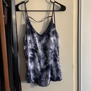 A blue tie-dye blouse